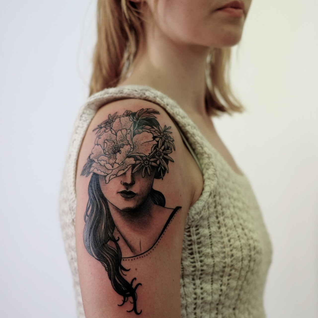 Create a colorful Vincent van Gogh Irises tattoo with an ancient Greek  female statue in the